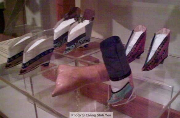 Examples of lotus shoes for Chinese women with bound feet, and a cast of a bound foot.